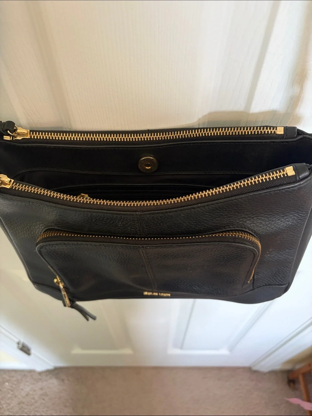 Calvin Klein Black Pebbled Leather Crossbody with Gold Accents